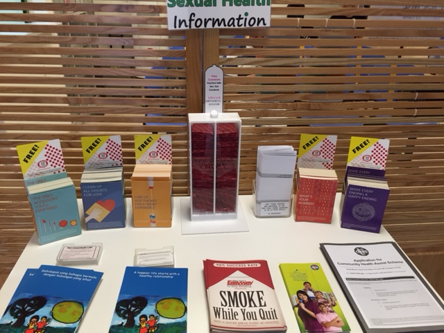 Educational pamphlets and a stack of free condoms just within the main entrance of the clinic.