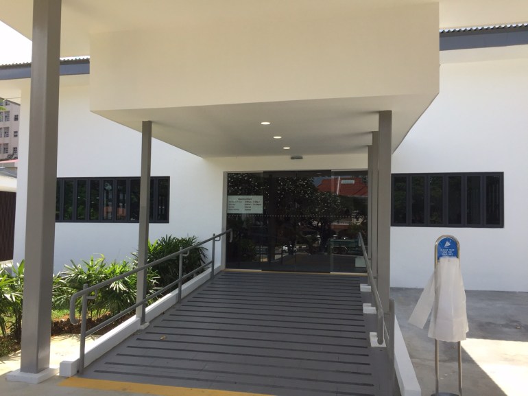A modern extension surrounding the bungalow, housing the Contact Clinic.